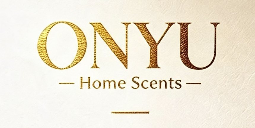 ONYU Home Scents logo in gold foil on cream card